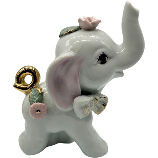 Vintage White Ceramic Elephant Figurine with Gold Tail & Highlighted Flowers