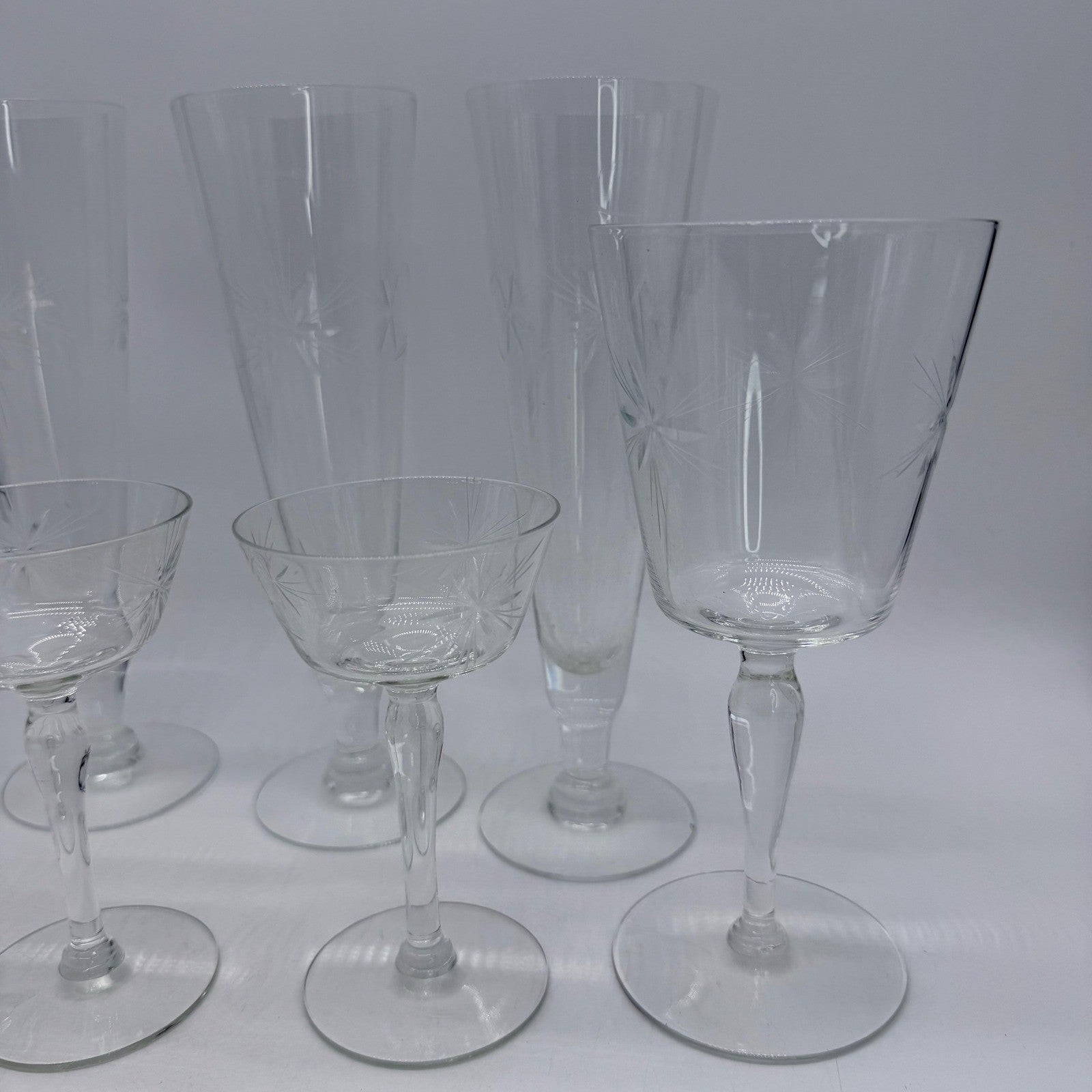 Vintage Etched Starburst Glass Stemware Set 7pc Flutes Wine Goblets Coupes MCM